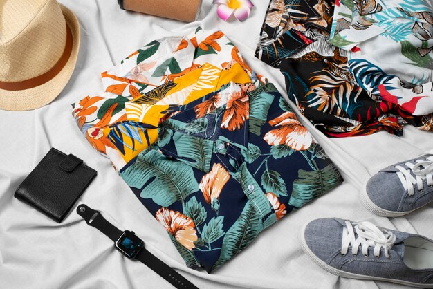 View of hawaiian shirts with wallet and smartwatch