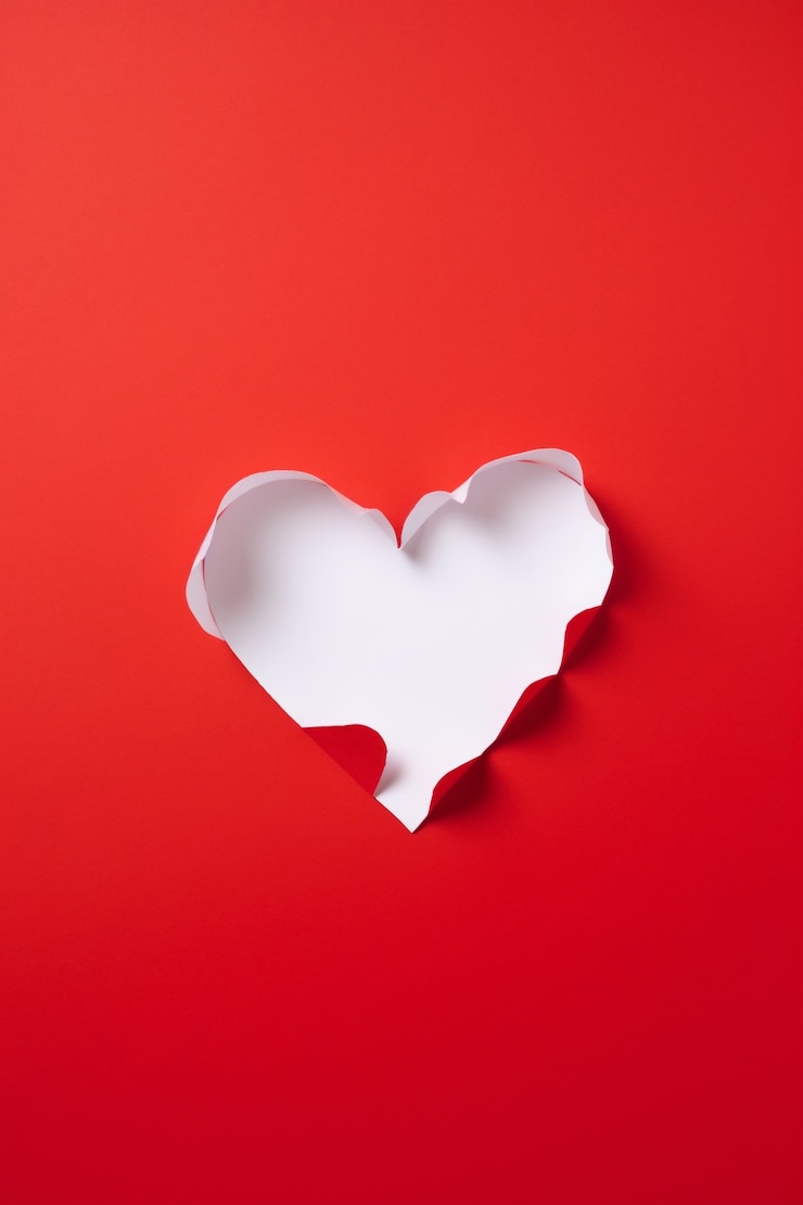 Free Photo view of heart shape in torn paper