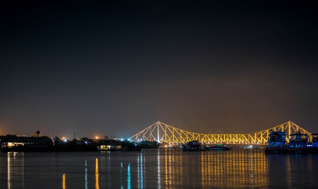 Howrah bridge from ganga Photo | Free Download