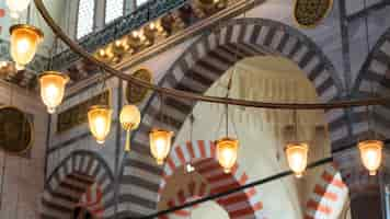 Free photo view of lamps inside the suleymaniye mosque in istanbul turkey