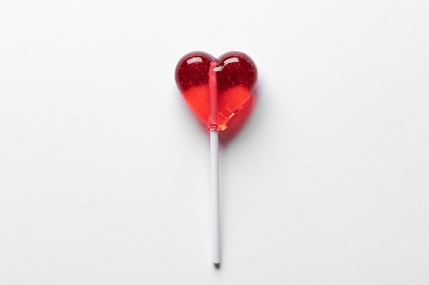 Free photo above view lollipop broken heart