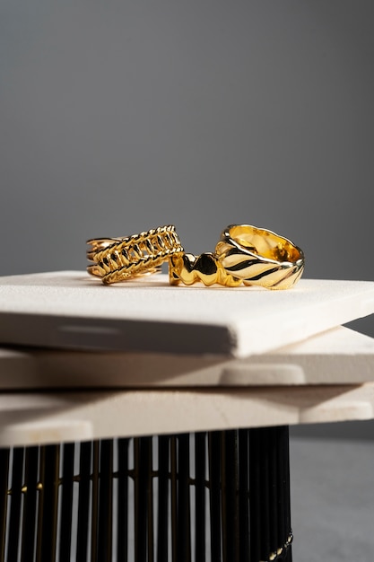 View of luxurious golden ring on felt jewelry display