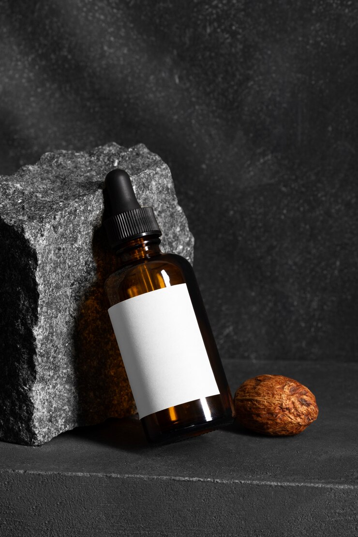 Free Photo view of male beauty products with rock or stone display