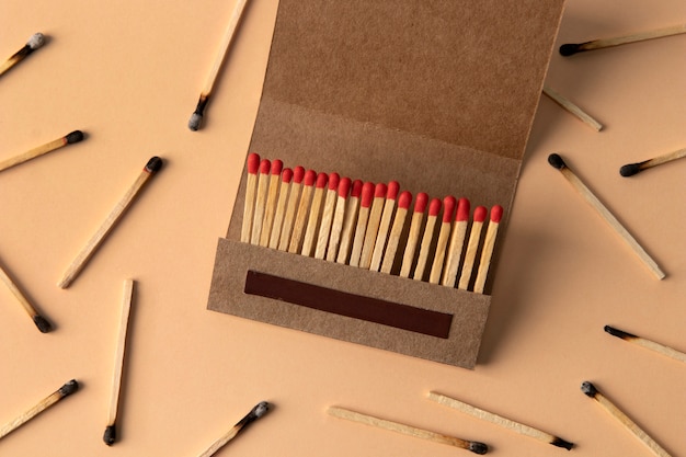 View of matchbox with wooden matchstiks