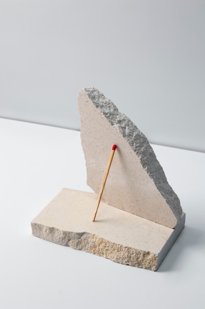 View of matchsticks with slab of stone