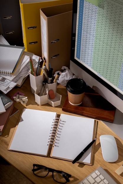 Free photo view of messy office workspace with personal computer