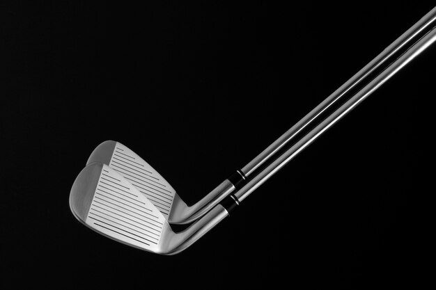 View of metallic golf clubs