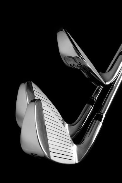 Free photo view of metallic golf clubs