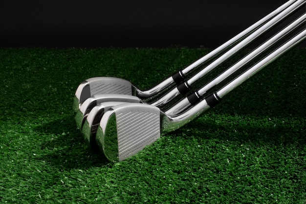 Free photo view of metallic golf clubs