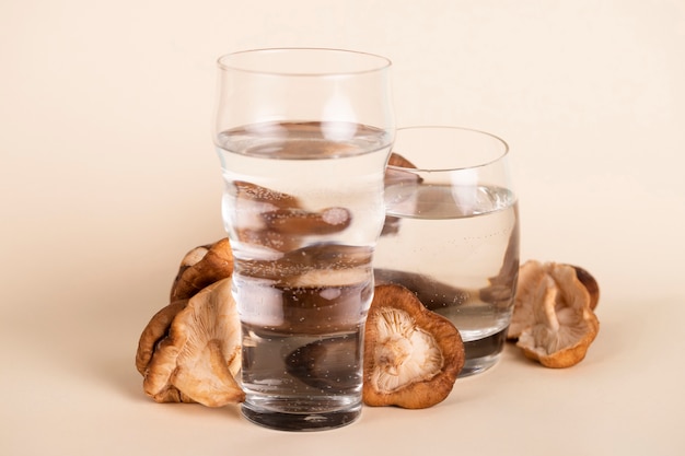 View of mushrooms and water glasses