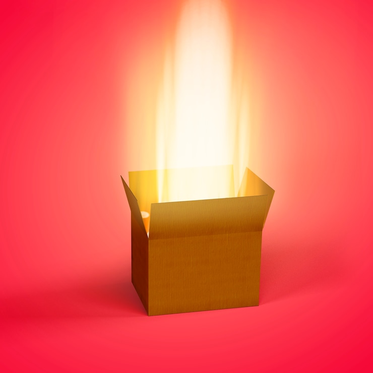 Free Photo view of mystery cardboard box with gleaming light coming from inside