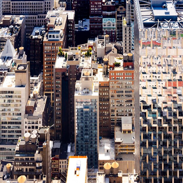 View of New York downtown from a view point USA Multiple skyscrapers roofs and facades