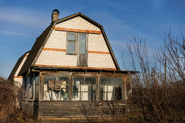 View of old and abandoned house in nature