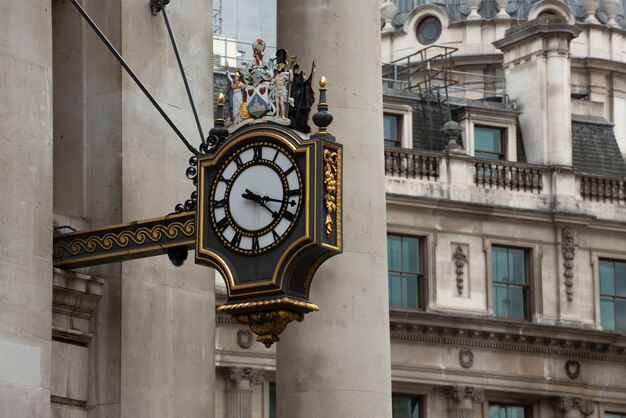 View of ornamental clock in london city