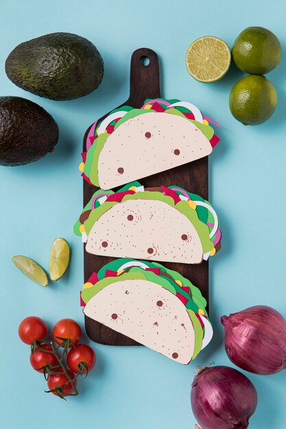 Above view paper tacos on wooden board