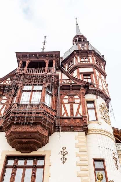 View of a part of Peles Castle from Sinaia, Romania. Medieval castle