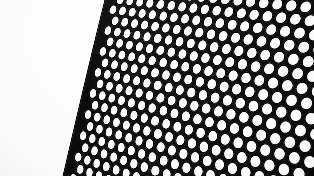 Free photo view of perforated sheet of material with tiny holes