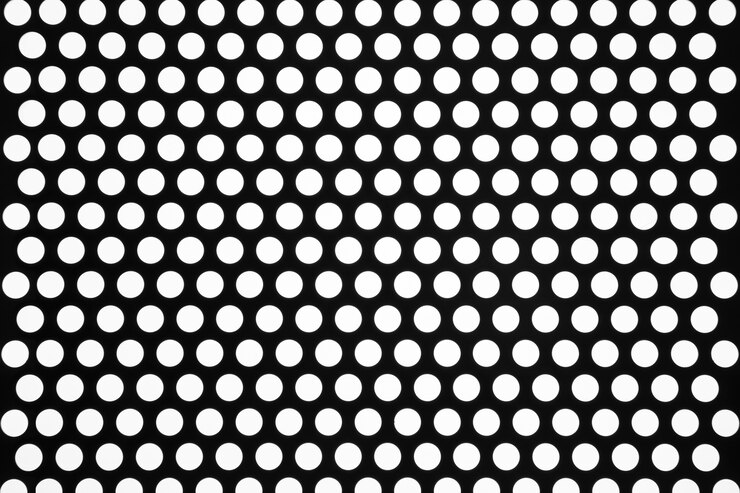 Free Photo view of perforated sheet of material with tiny holes
