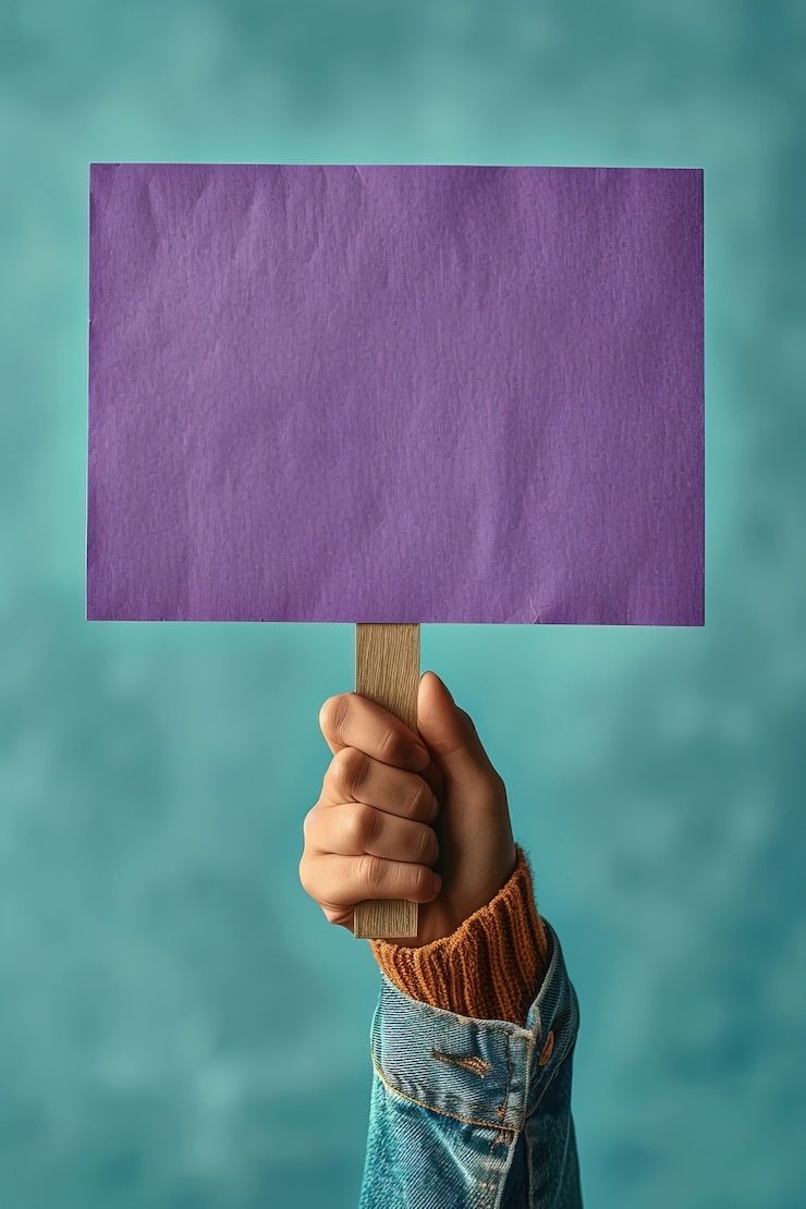 Free Photo view of person holding blank purple placard for womens day celebration
