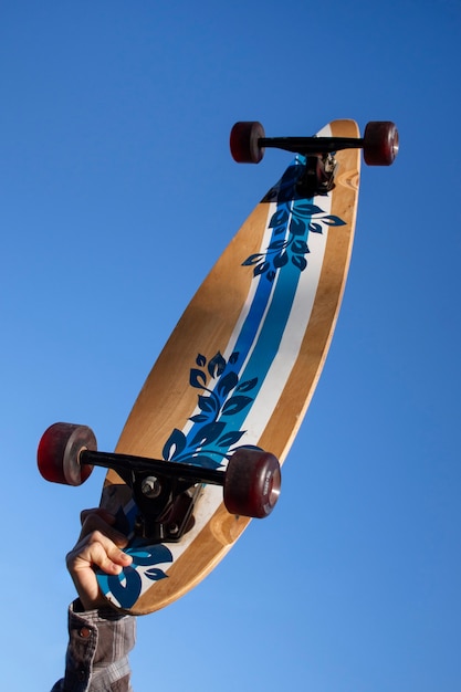 View of person using skateboard with wheels outdoors