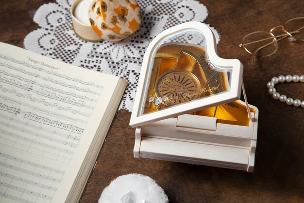 View of piano shaped music box with bohemian decor