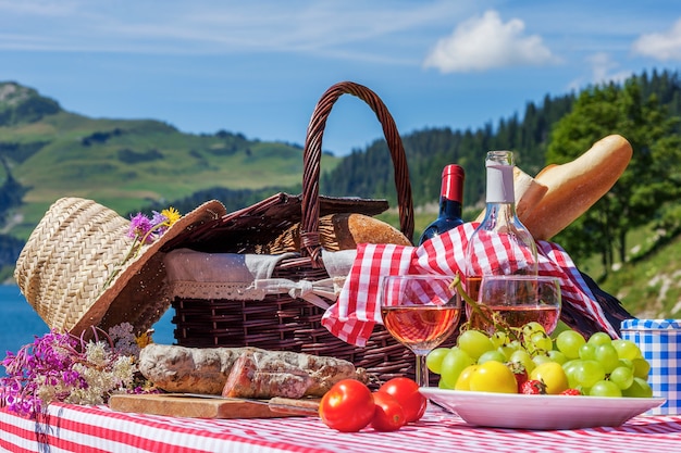 View of picnic in french alpine mountains with lake