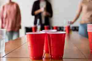 Free photo view of plastic cups used for beer pong at a party