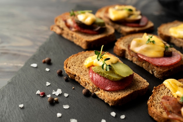 View of raclette dish with delicious food assortment