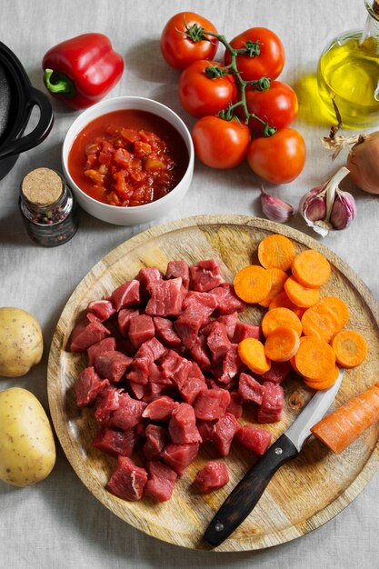 Above view raw beef and vegetables arrangement