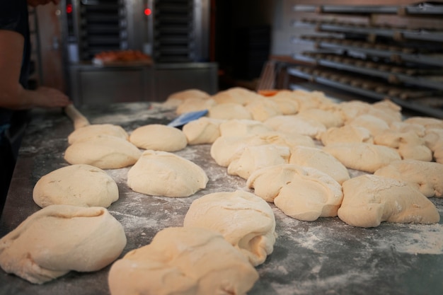 Free photo view of raw bread dough in the pastry shop