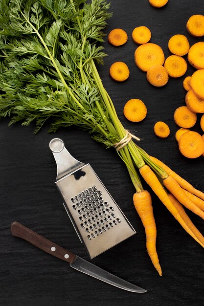 Free photo above view raw carrots arrangement