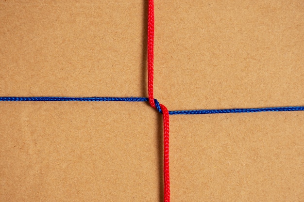 Free photo view of red thread intertwined with blue