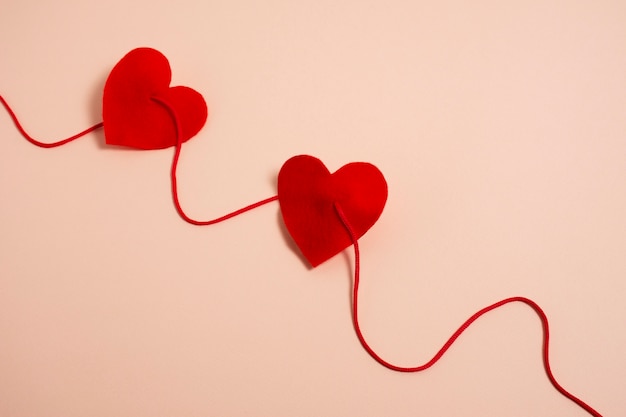 Free photo view of red thread with heart shape