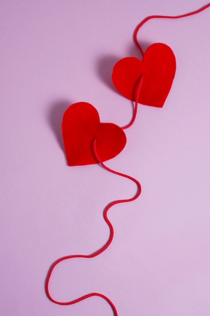 View of red thread with heart shape