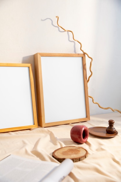 View of room decor made up of frames and plates with magazine