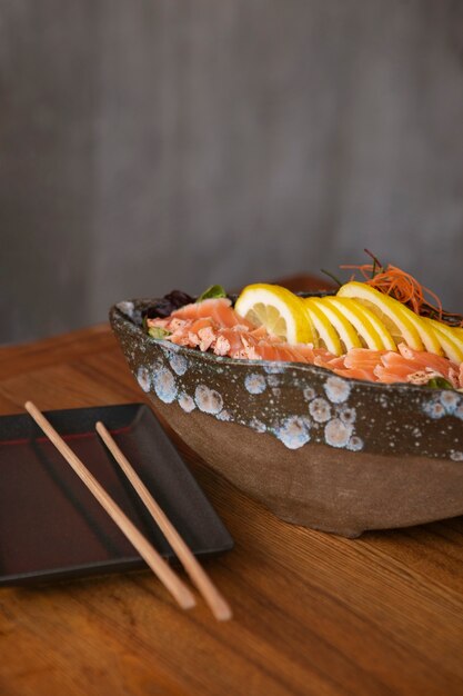 Free photo view of salmon dish bowl