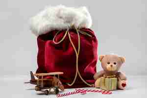 Free photo view of santa claus bag with presents and toys