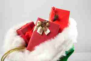 Free photo view of santa claus bag with wrapped gifts