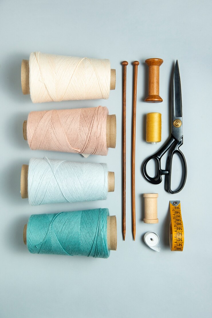 Free Photo above view sewing supplies arrangement