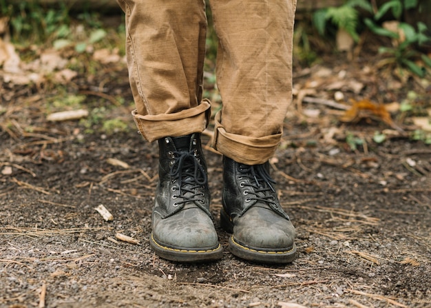 View on shoes of man in nature