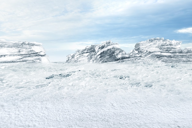 View of a snowy hill with blue sky background