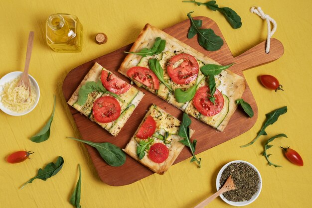 Above view square pizza on wooden board