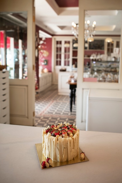 Free photo view of strawberry cake in a bakery shop