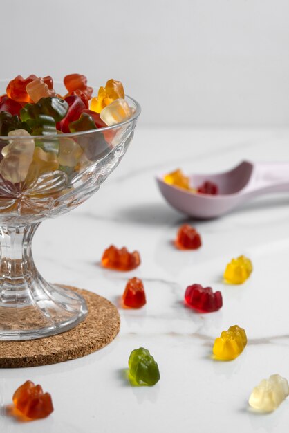 View of sweet gummy bears with bowl