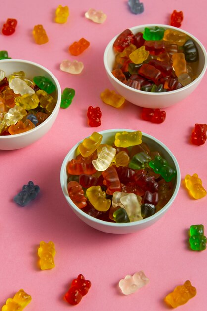 View of sweet gummy bears with bowl