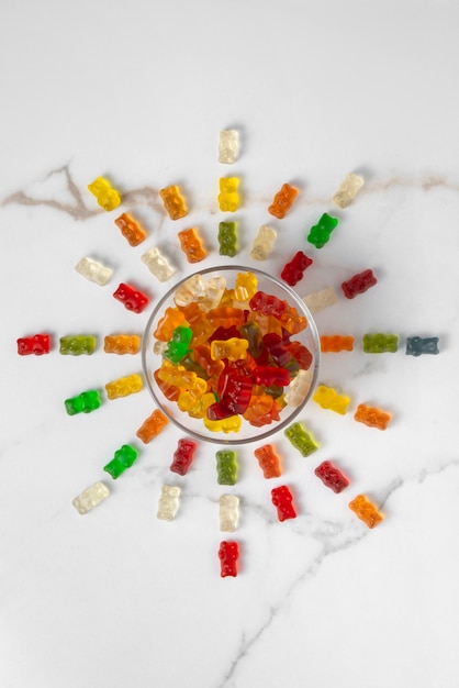 View of sweet gummy bears with bowl