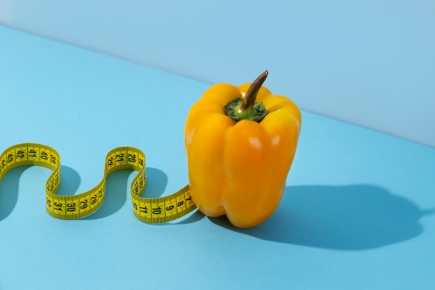 View of tape measure with bell pepper