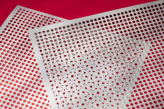 Free photo view of tiny holes in perforated sheet of material