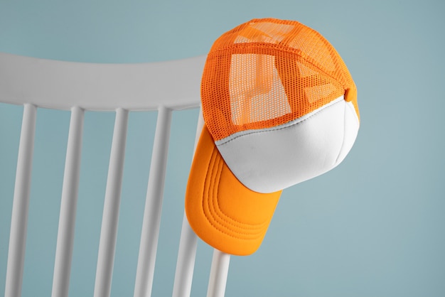view of trucker hat on chair