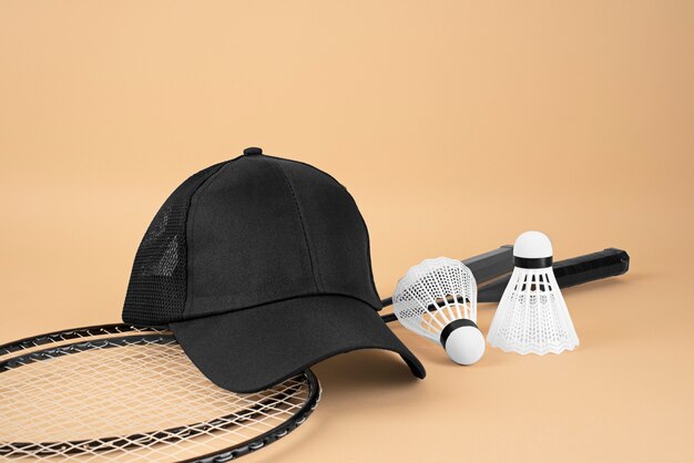 View of trucker hat with badminton set